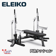 ブラック×シルバーカラーのELEIKO IPFコンペティションコンボラック PURクッション仕様を右前方から捉え、ベンチと支柱全体の仕様が分かる構成

