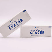 黒のThe Toe Spacerの5ループタイプが入ったパッケージを2箱並べた状態を正面から捉え、ブランドロゴと製品名の配置が分かる外箱デザインを確認できる商品構成