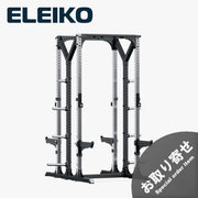 ELEIKO プレステララック ステンレスとブラックのダブルハーフラック・トールタイプ。斜め前方から見た全体構造で、シルバーの支柱、前後2面のトレーニングスペース、セーフティアーム、プレート収納ホルダーを備えた大型ラック。